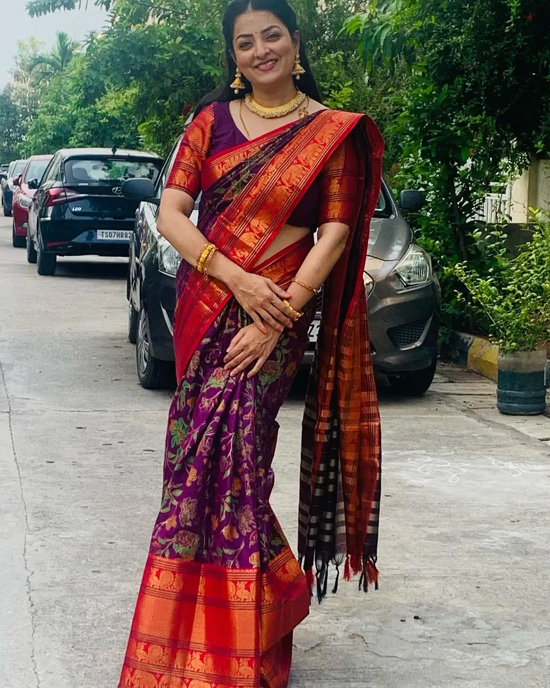 ETV Abhiruchi Madhuri Kandavalli In Traditional Violet Saree Red Blouse